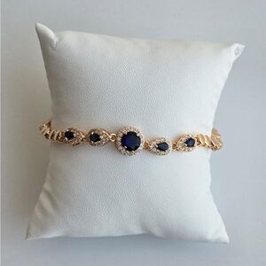 Gold plated cubic zirconia bracelet.